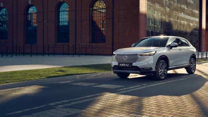 Side facing Honda HR-V in city location.